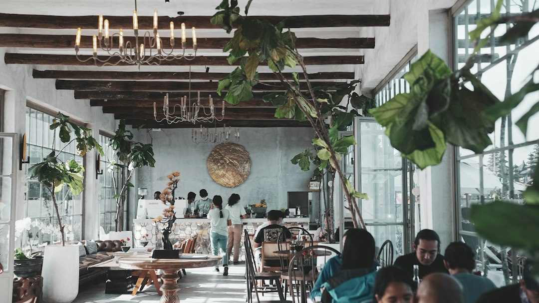 People working together around a table in a coworking-style room